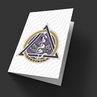a card with a purple triangle on it
