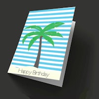 a happy birthday card with a palm tree on it